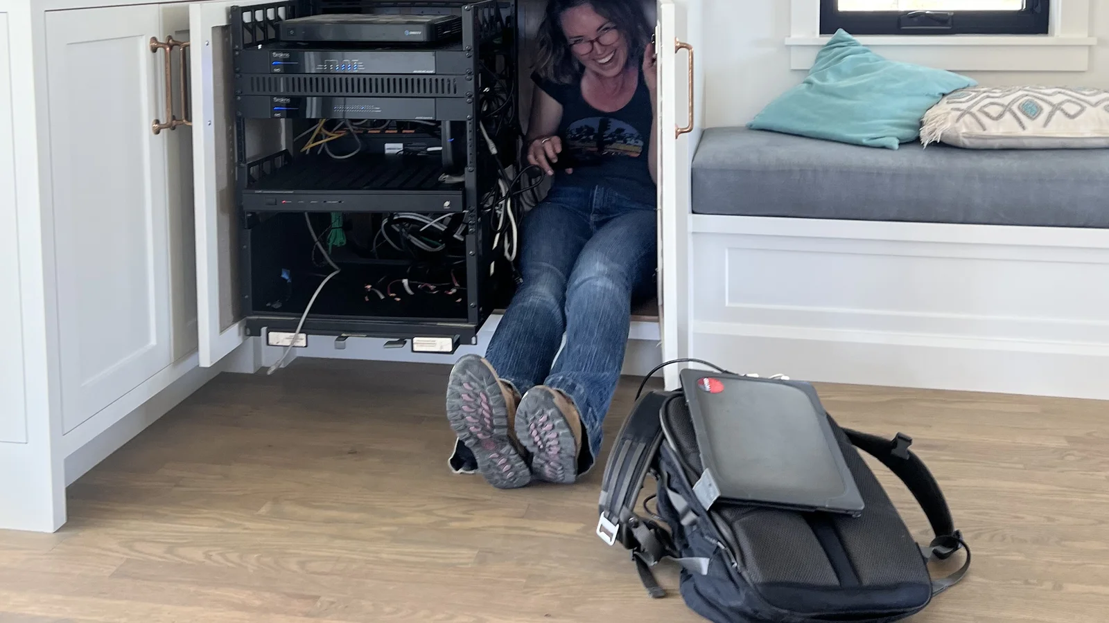KIZA technician inside kitchen island rack